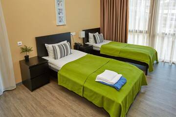Двухместный номер с 2 отдельными кроватями  в Гостевом доме SKYPARK ApartHotel